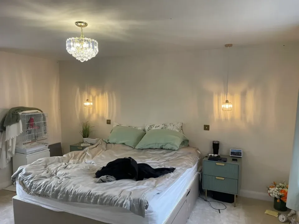 Bedside lighting installed in a new-build master bedroom